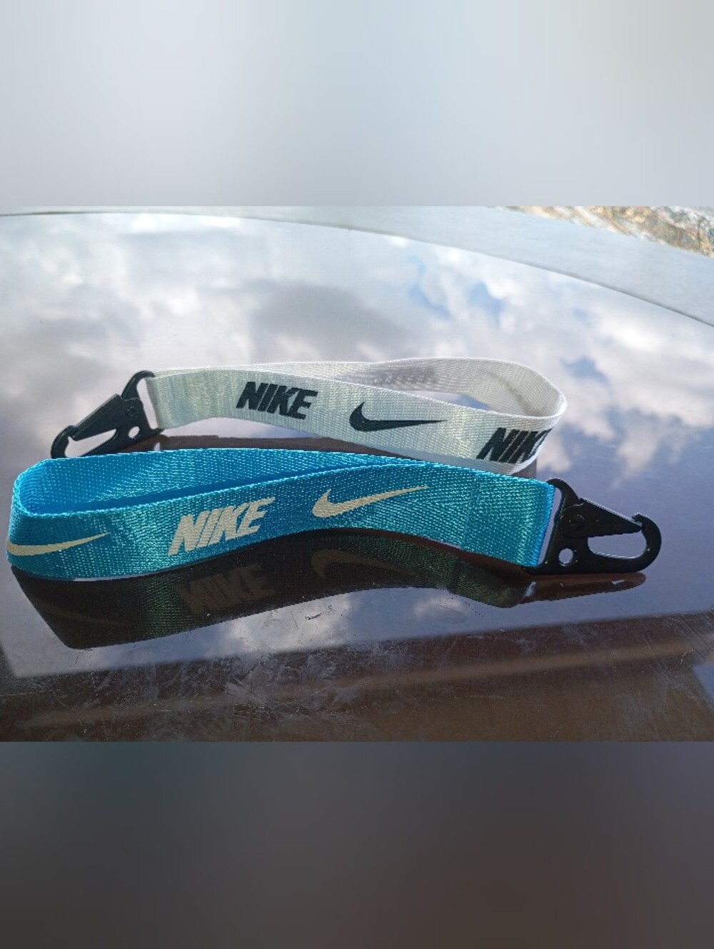 Nike Keychain Set Of 2..in White, Teal, and Black